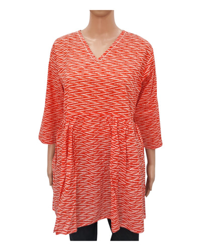 Buy Cotton Peplum Top With V Neck in orange – Tvahra