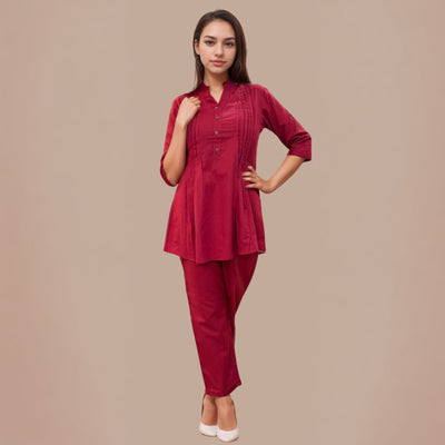 Woman wearing a red outfit on a beige background