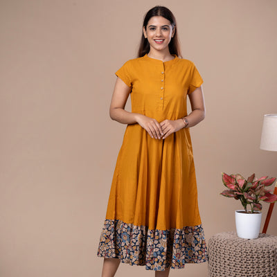 Women's Mustard Solid Cotton Dress With Kalamkari Frill