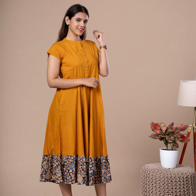 Women's Mustard Solid Cotton Dress With Kalamkari Frill