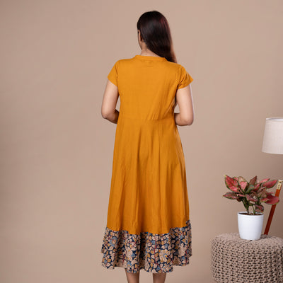 Women's Mustard Solid Cotton Dress With Kalamkari Frill