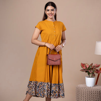 Women's Mustard Solid Cotton Dress With Kalamkari Frill